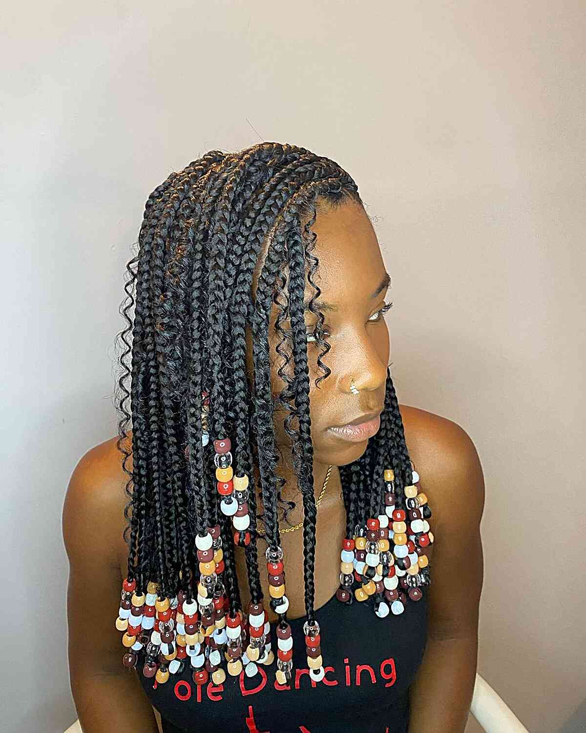 Mid-Back Box Braids With Red Undertones and Metallic Beads Mid-Back Box Braids With Red Undertones and Metallic Beads — Simple Hairstyles with Beads