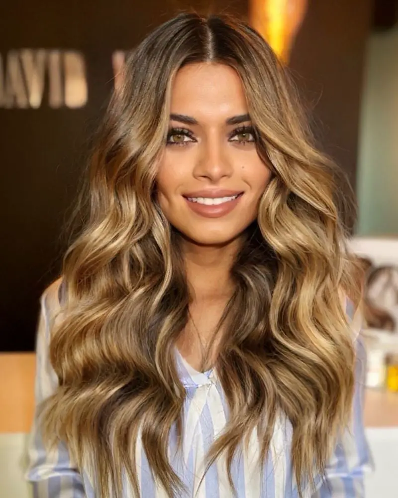 Dark Blonde Mid-Back With Face-Framing Layers and Curtain Bangs — Simple Highlights on Blonde