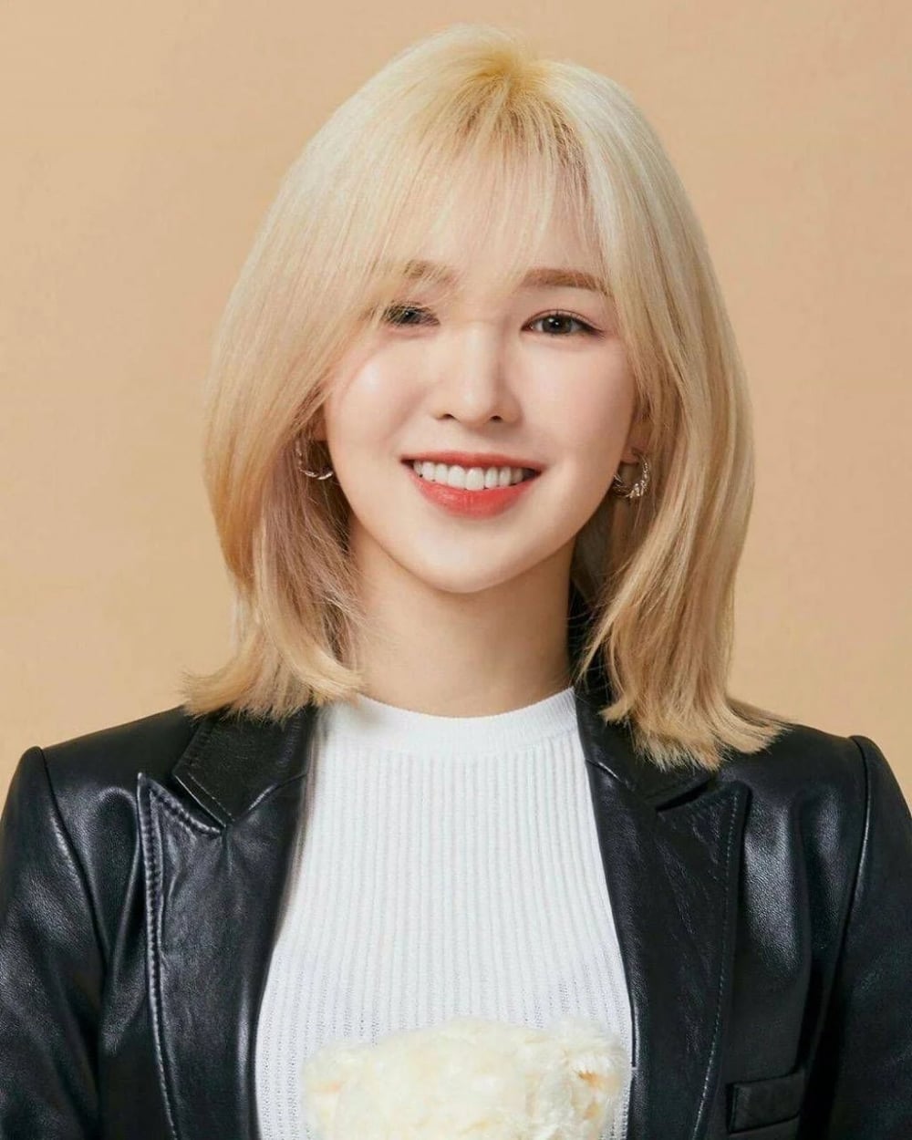 Leather Jacket Complements Blonde Lob — Simple Hush Cut