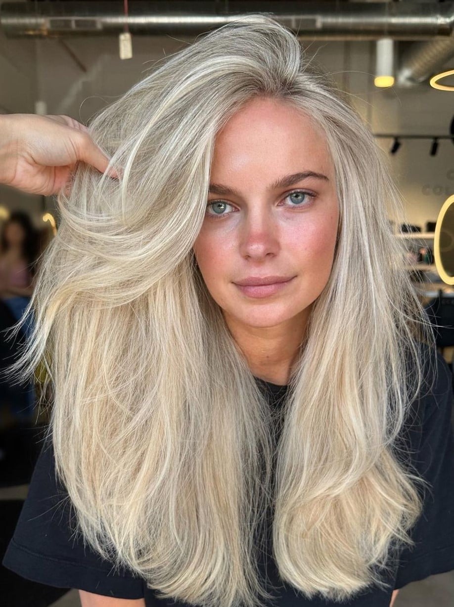 Thick Wavy Platinum Blonde With Ash Undertones Thick Wavy Platinum Blonde With Ash Undertones — Simple Icy Blonde