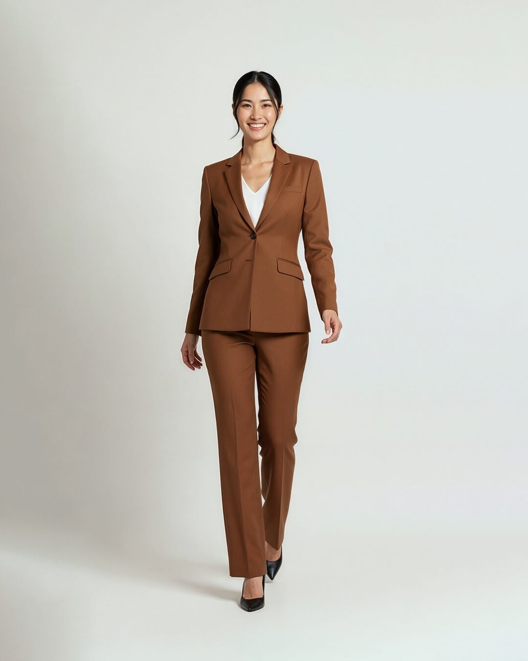 Classic Brown Suit with White V-Neck Top and Black Heels Classic Brown Suit with White V-Neck Top and Black Heels — Simple Job Interview Outfits