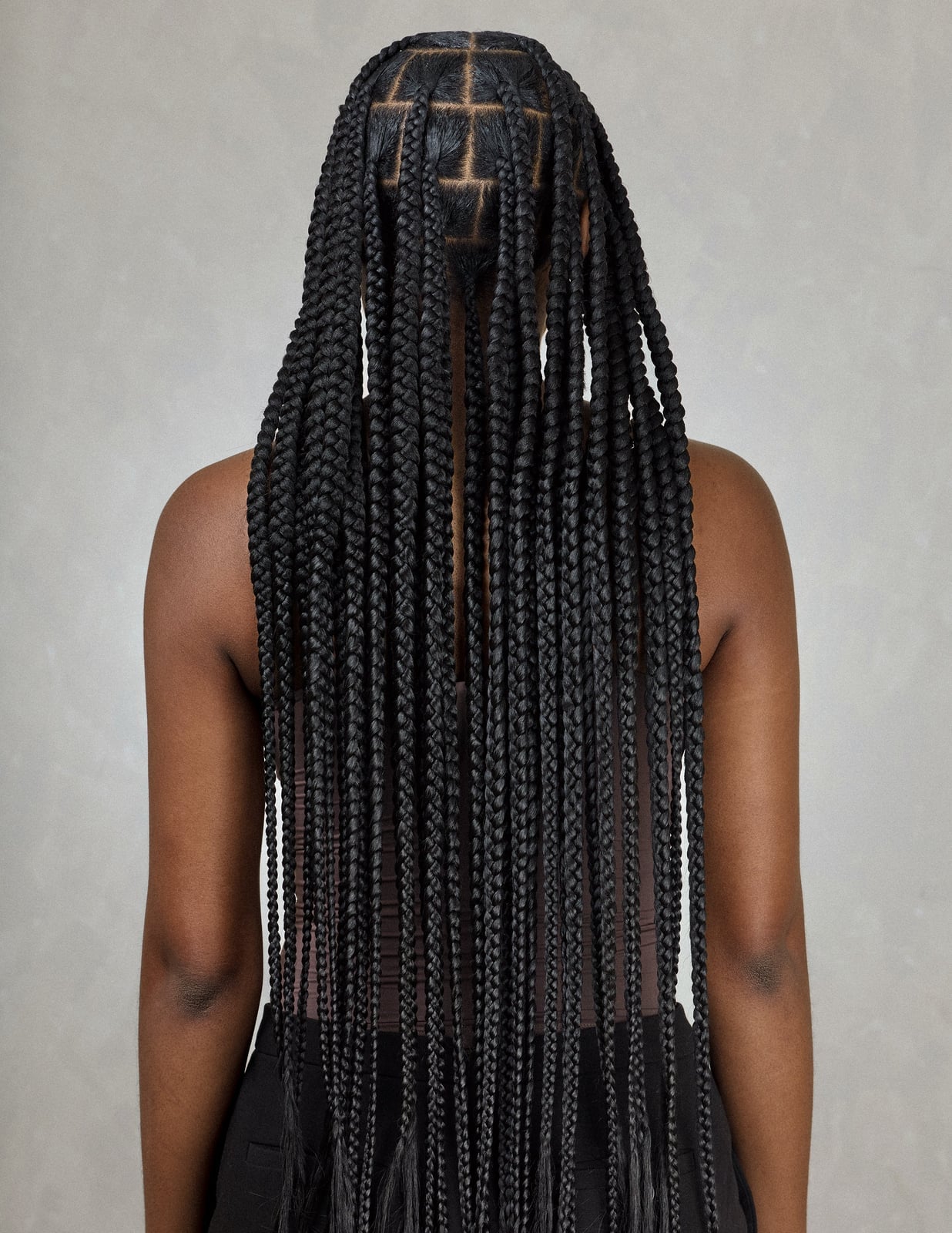 Sleek Black Braids With Square Scalp Sections Sleek Black Braids With Square Scalp Sections — Simple Large Knotless Braids