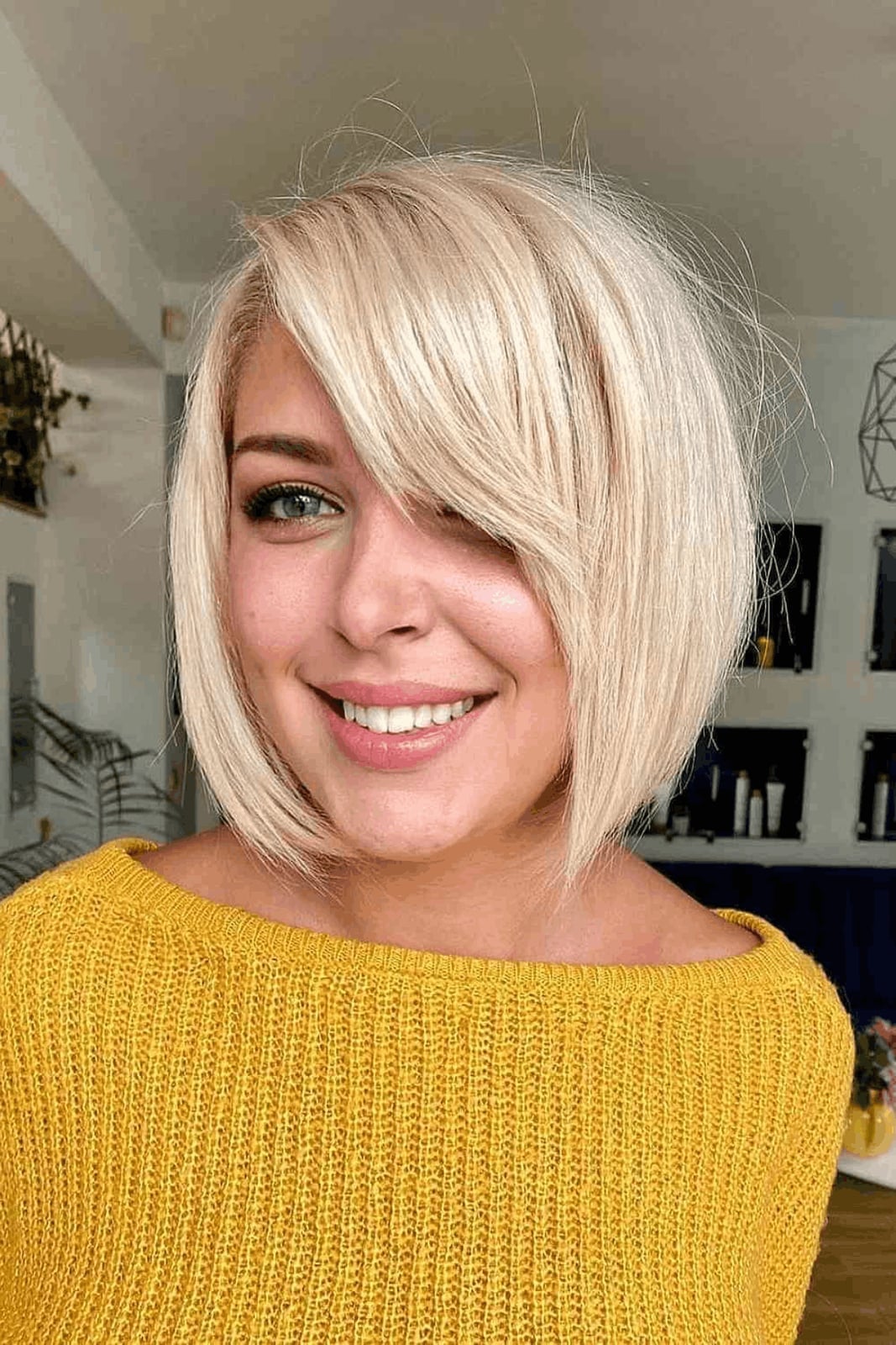 Collarbone Bob With Wavy Blowout And Curtain Bangs Collarbone Bob With Wavy Blowout And Curtain Bangs — Simple Layered Bob Hairstyles
