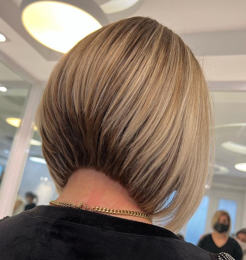 Chin Length Stacked Bob With Contrast Roots Chin Length Stacked Bob With Contrast Roots — Simple Layered Bob Hairstyles