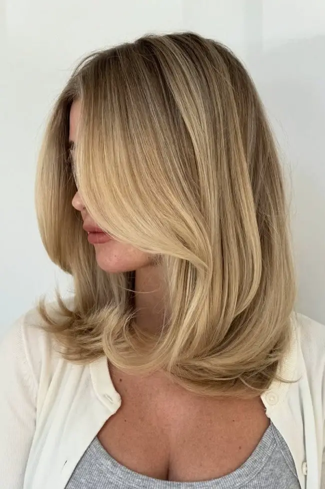 Shoulder Length Layers In Creamy Blonde Shoulder Length Layers In Creamy Blonde — Simple Layered Haircuts for Medium Hair
