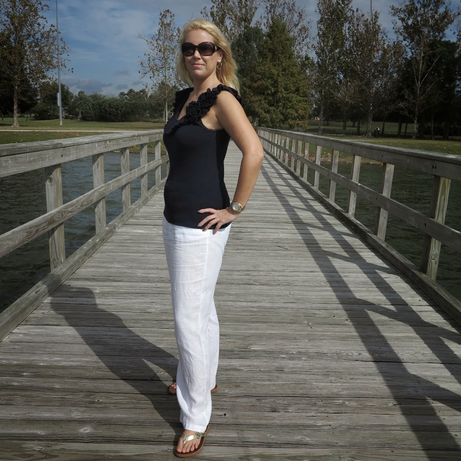 White Linen Trousers with Ruffled Black Top White Linen Trousers with Ruffled Black Top — Simple Linen Pants Outfits