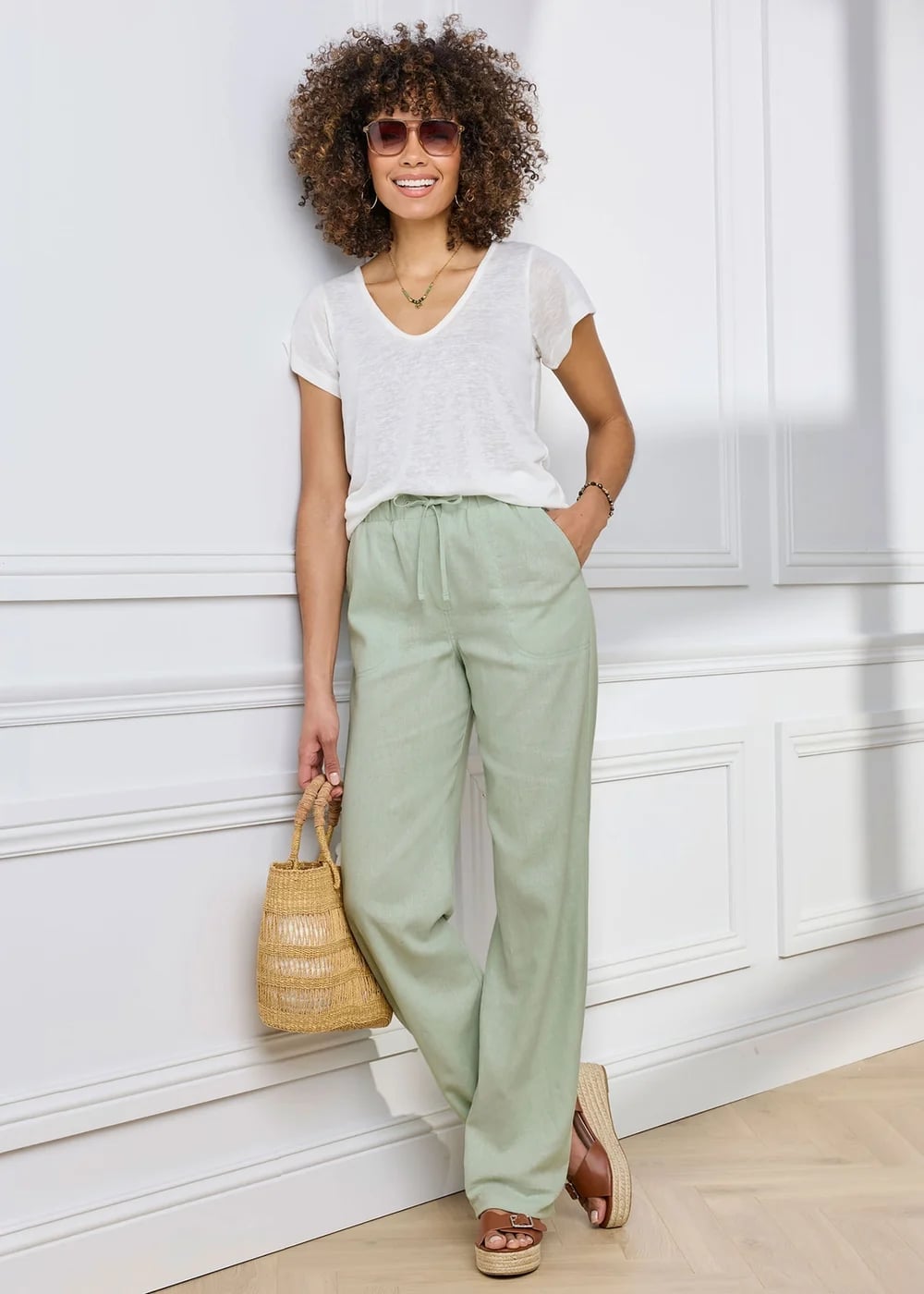 Pale Mint Linen Blend Trousers with White T-Shirt Pale Mint Linen Blend Trousers with White T-Shirt — Simple Linen Pants Outfits