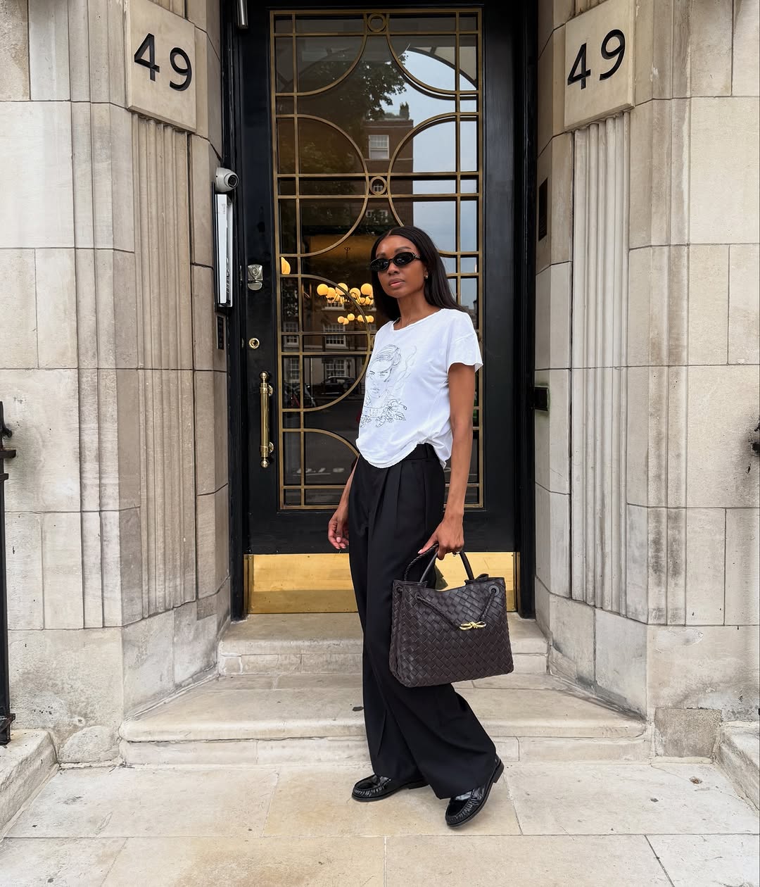 Black Patent Loafers with Wide Leg Trousers and Graphic Tee — Simple Loafer Outfits