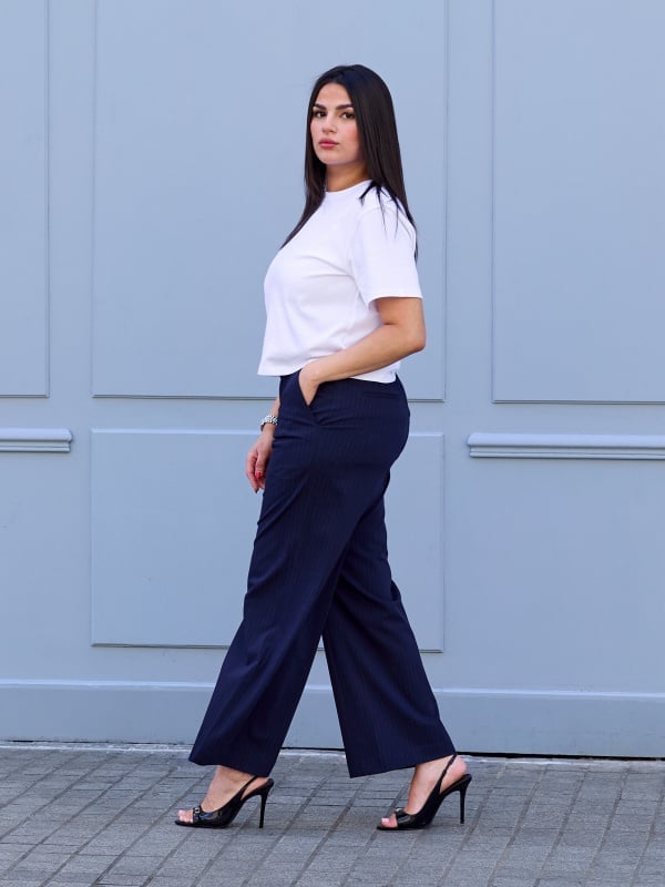 Pinstripe Trousers With a Simple White Tee Pinstripe Trousers With a Simple White Tee — Simple Navy Blue Pants Outfits