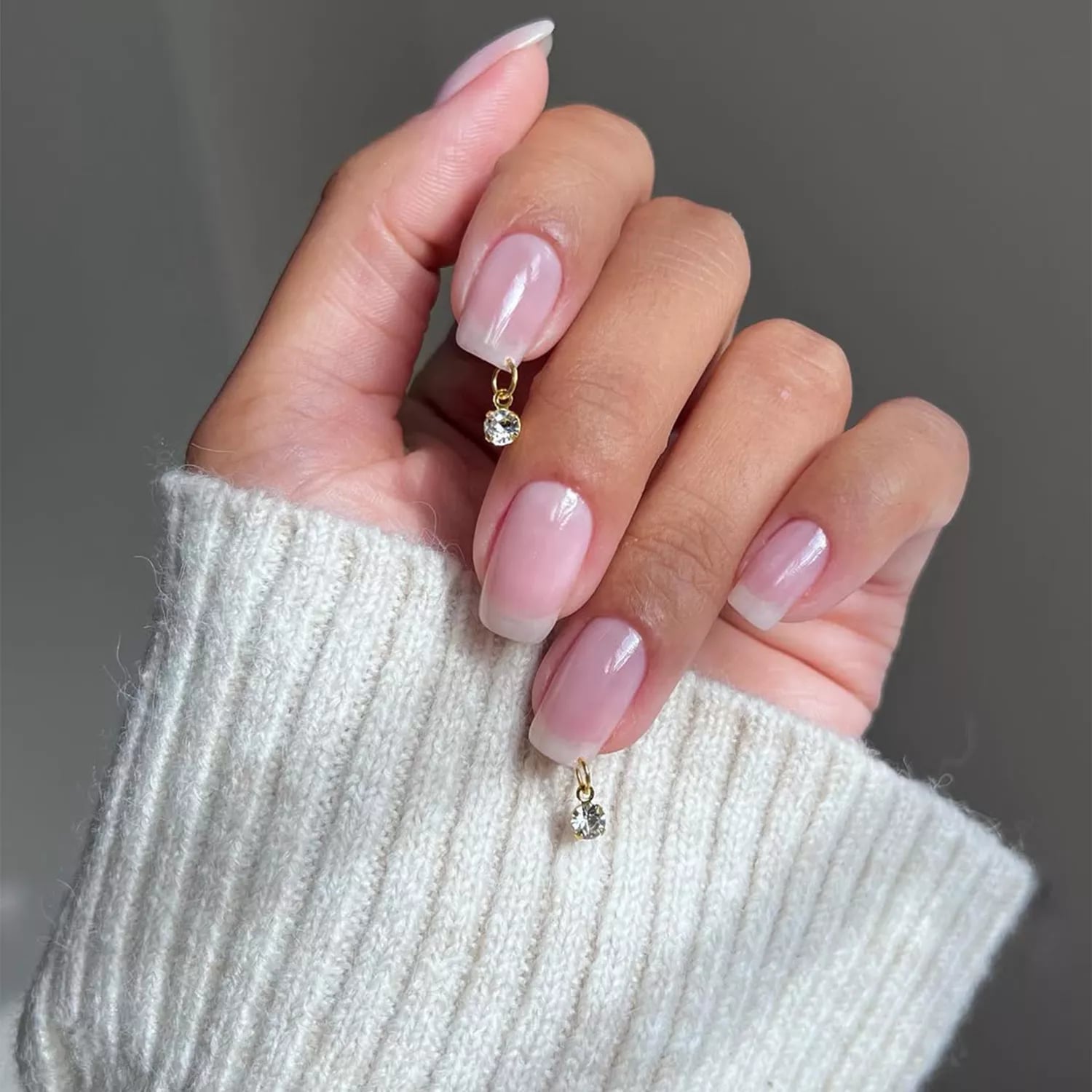 Milky Pink Short Almond with Gold Charms Milky Pink Short Almond with Gold Charms — Simple Neutral Nails
