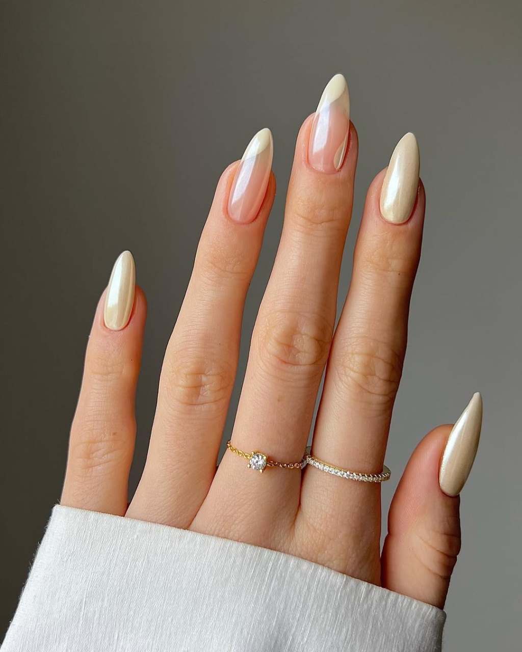 Medium Almond Pale Champagne High-Shine Chrome, Close-Up Take — Simple Nude Chrome Nails