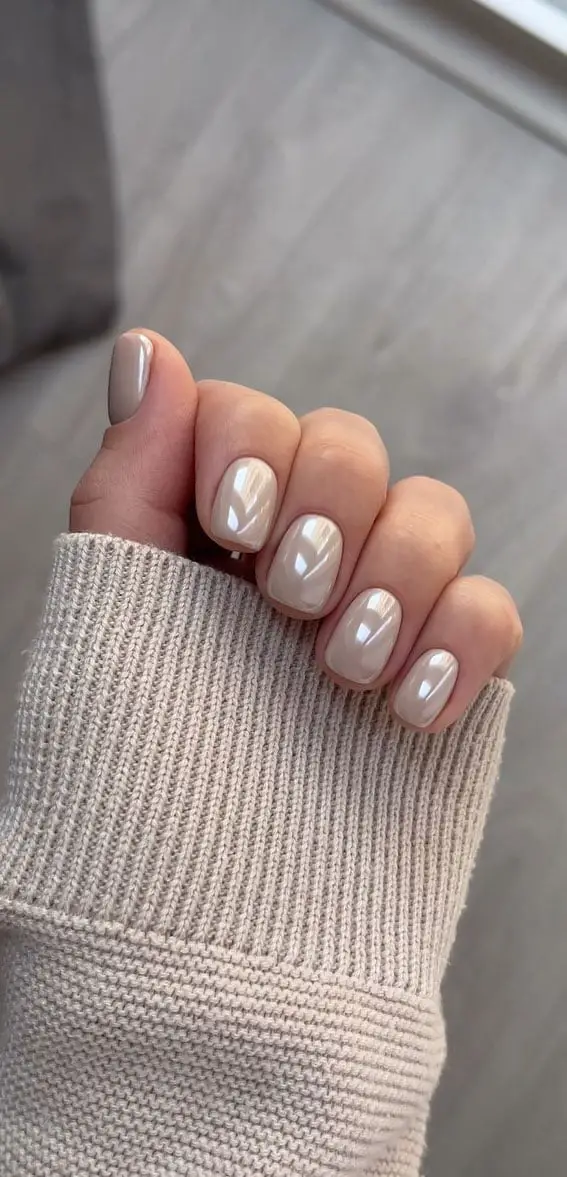 Short Almond Milky Nude Glossy Chrome Nails, Close-Up Take — Simple Nude Chrome Nails