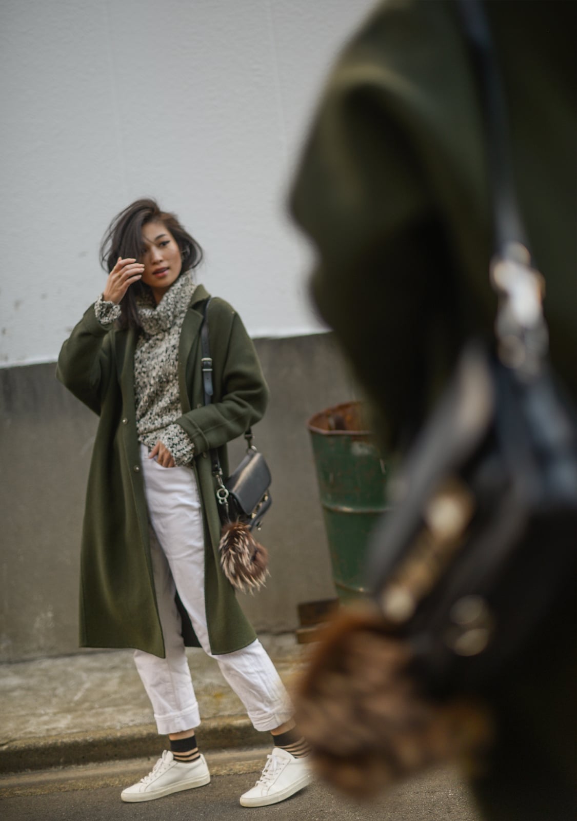 Olive Green Wool Coat Over Knit Sweater and White Pants — Simple Olive Green Outfits