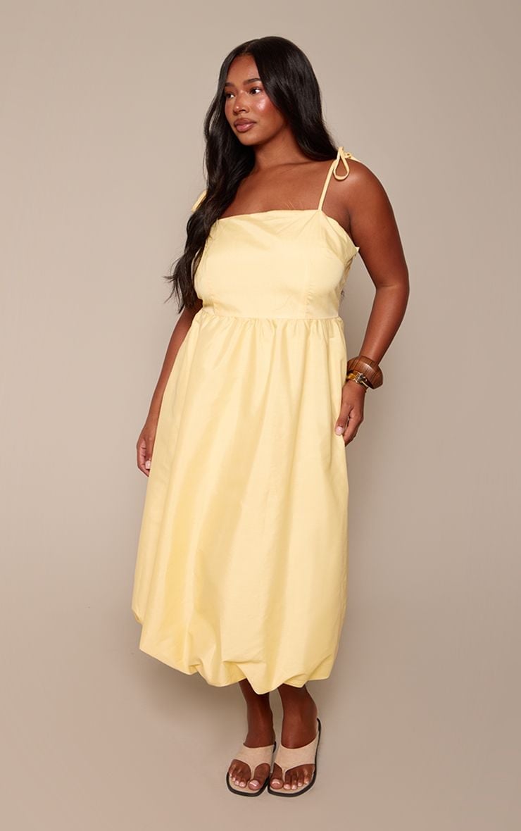 Pale Yellow Midi Dress with Tie Straps and Balloon Hem Pale Yellow Midi Dress with Tie Straps and Balloon Hem — Simple Outfits for Curvy
