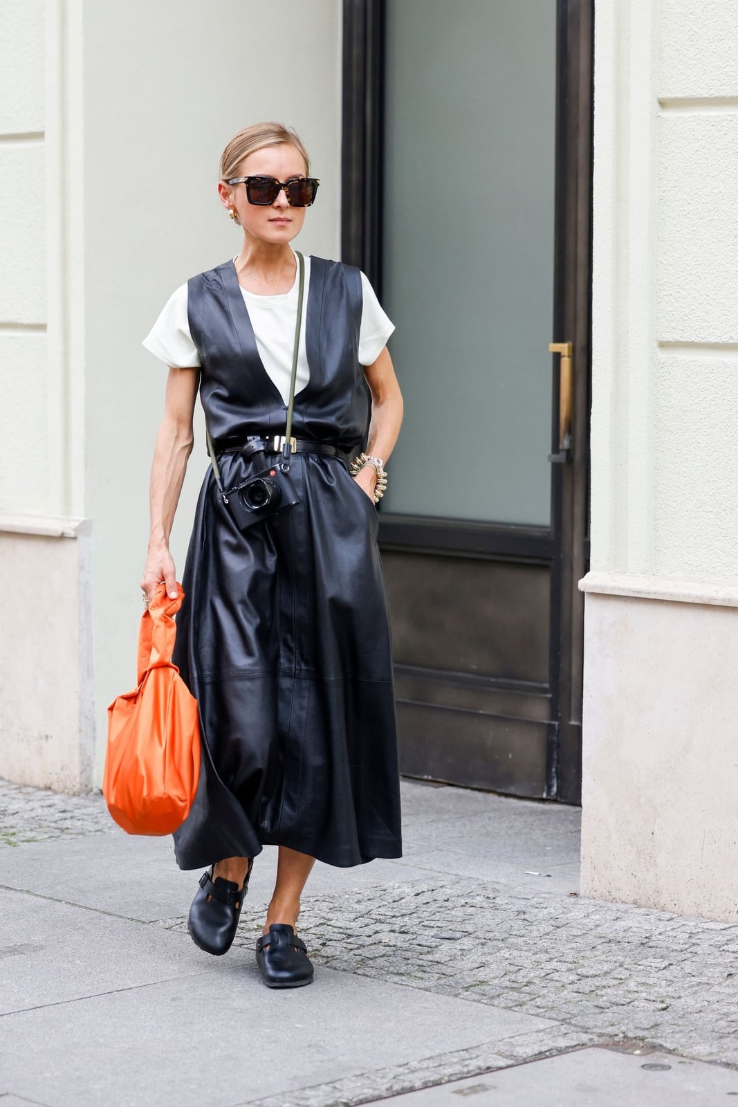 Black Leather Dress Over White T-Shirt Black Leather Dress Over White T-Shirt — Simple Outfits with Birkenstocks