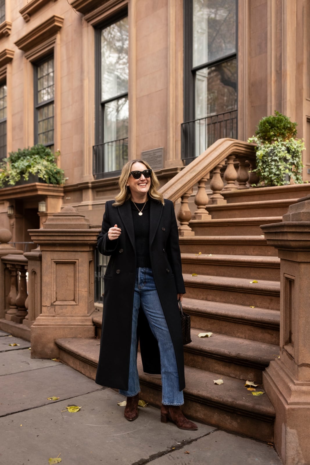 Black Wool Coat Over Crewneck Sweater and Jeans — Simple Photoshoot Outfits