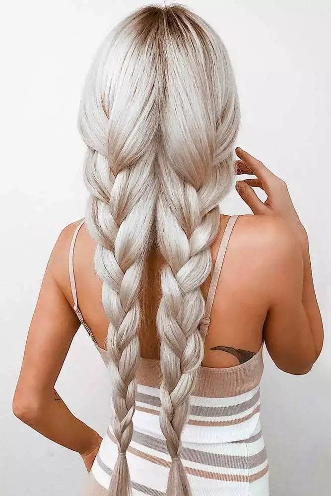 Mid-Back Blonde Highlights Fishtail Braids Side View Mid-Back Blonde Highlights Fishtail Braids Side View — Simple Pigtails Braids
