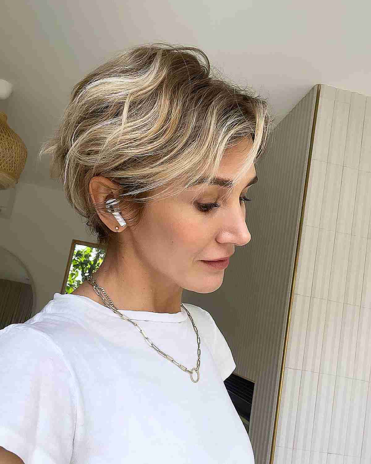 Textured Blonde Pixie With Side Sweep Textured Blonde Pixie With Side Sweep — Simple Pixie Hairstyles
