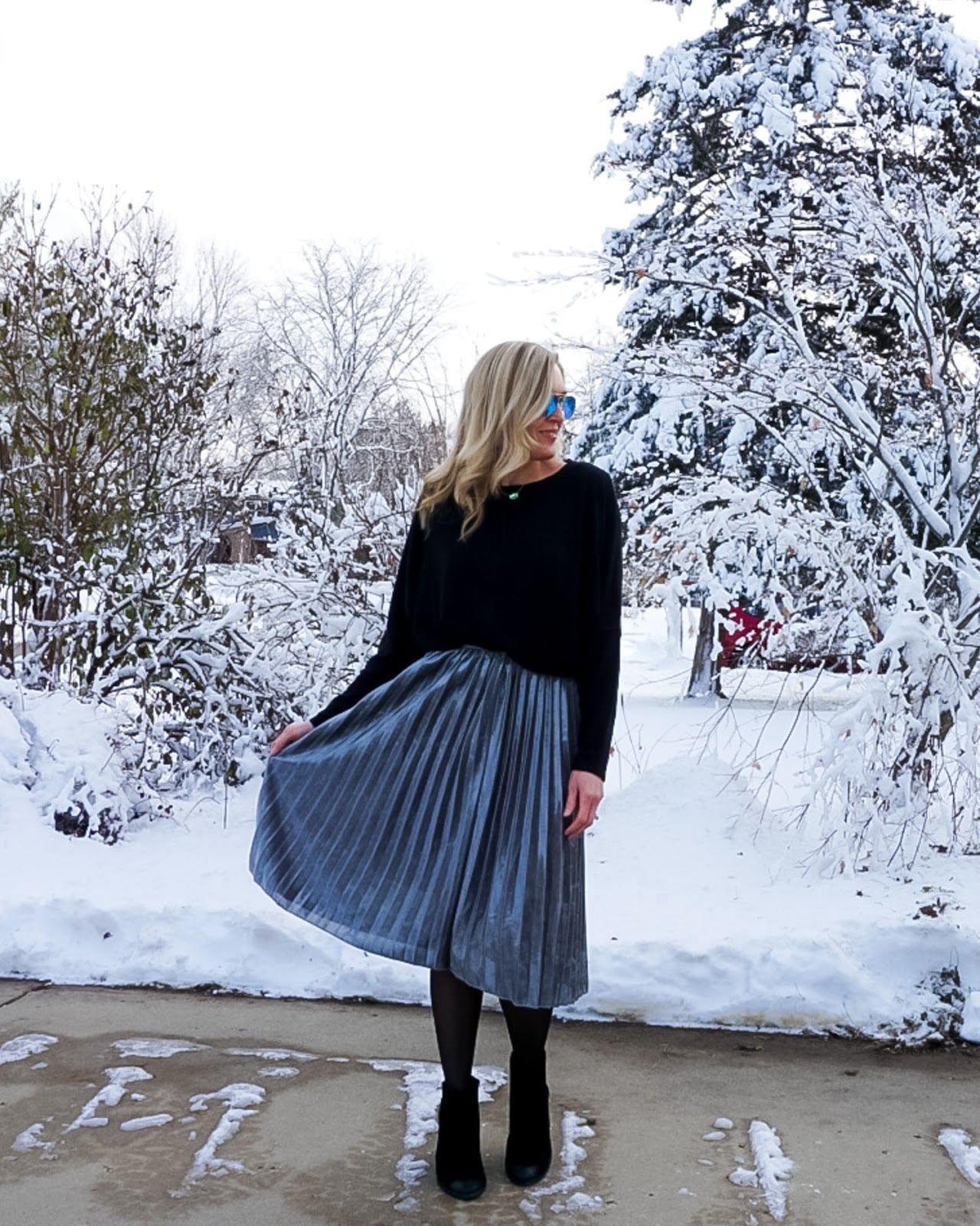 Silver Metallic Pleated Midi Skirt with Black Sweater, Close-Up Take Silver Metallic Pleated Midi Skirt with Black Sweater, Close-Up Take — Simple Pleated Skirt Outfits