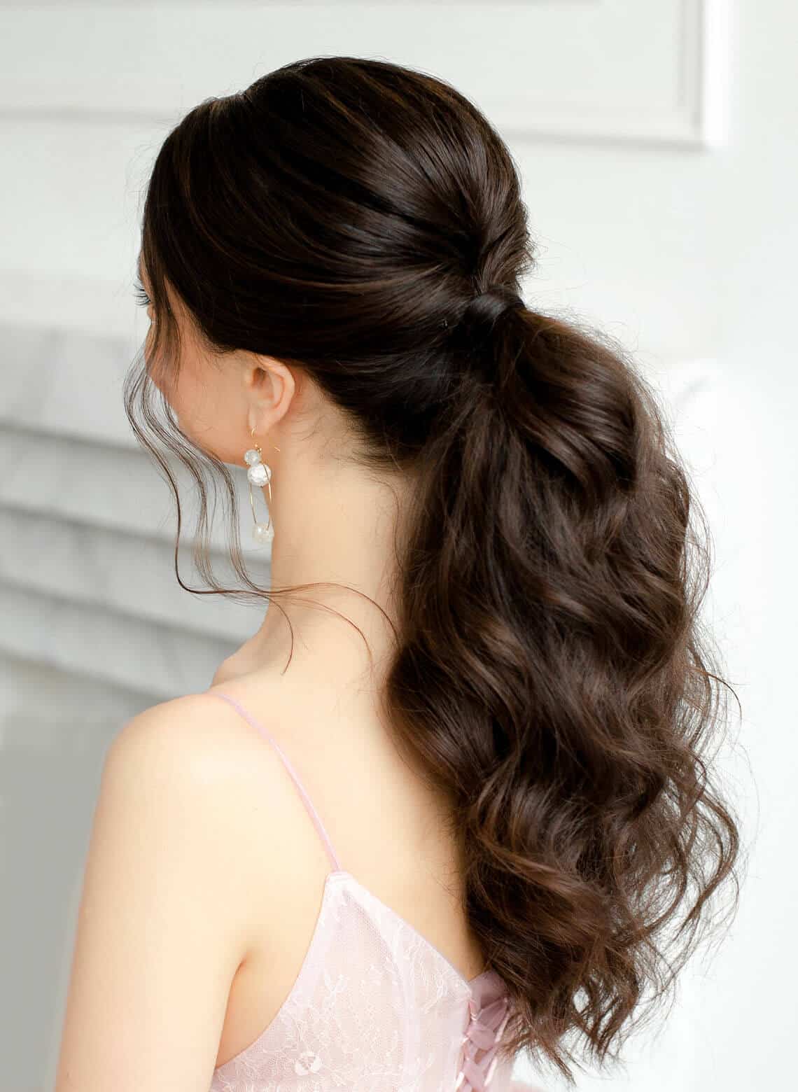 Mid-Back High Ponytail With Voluminous Waves Mid-Back High Ponytail With Voluminous Waves — Simple Professional Hairstyles
