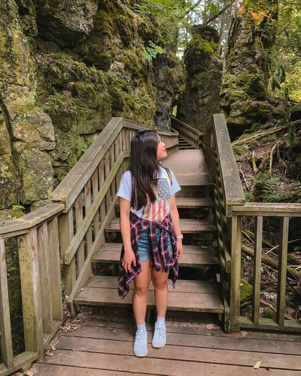 Denim Shorts with Plaid Shirt Tied Around Waist Denim Shorts with Plaid Shirt Tied Around Waist — Simple Road Trip Outfits
