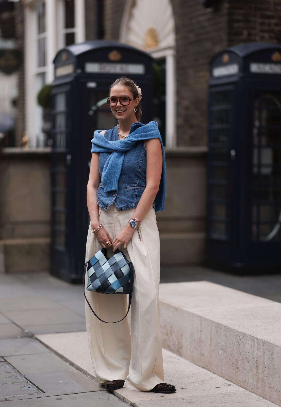 Cream Trousers with a Denim Vest and Draped Sweater Cream Trousers with a Denim Vest and Draped Sweater — Simple Road Trip Outfits