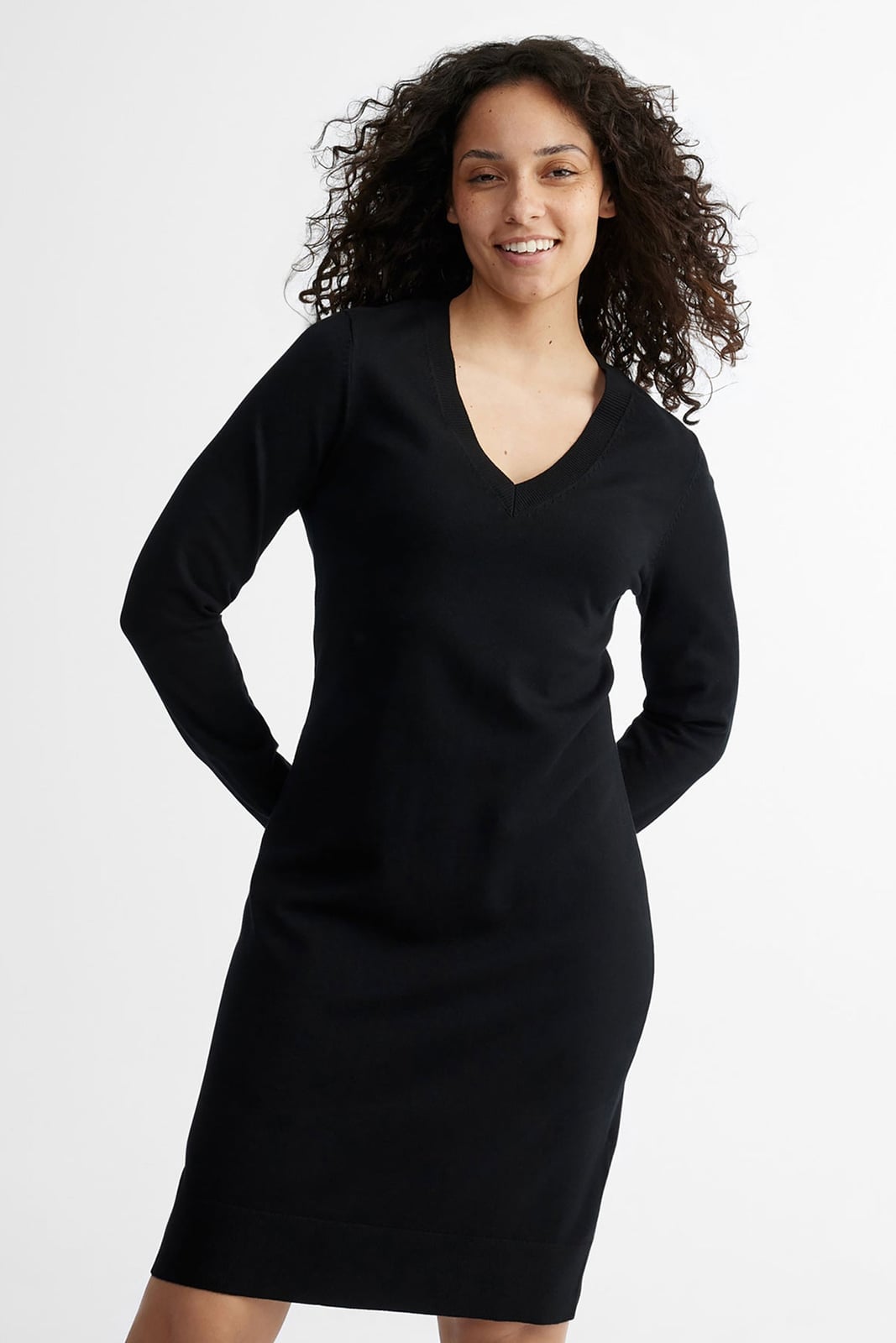 Black Long-Sleeve Knit Dress with Deep V-neck Black Long-Sleeve Knit Dress with Deep V-neck — Simple Semi Formal Outfits