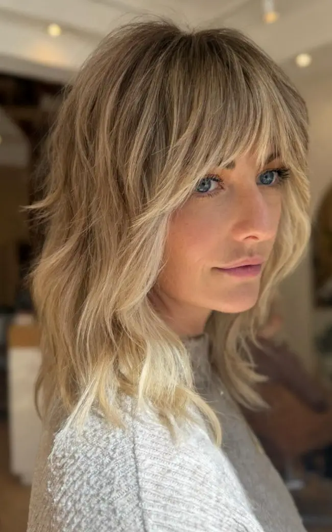 Mid-Back Ash Blonde Shag Full Bangs — Simple Shag Haircut