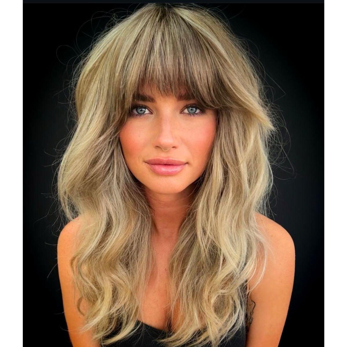 Collarbone Shag With Ash Blonde Highlights And Curtain Bangs Collarbone Shag With Ash Blonde Highlights And Curtain Bangs — Simple Shag Hairstyles