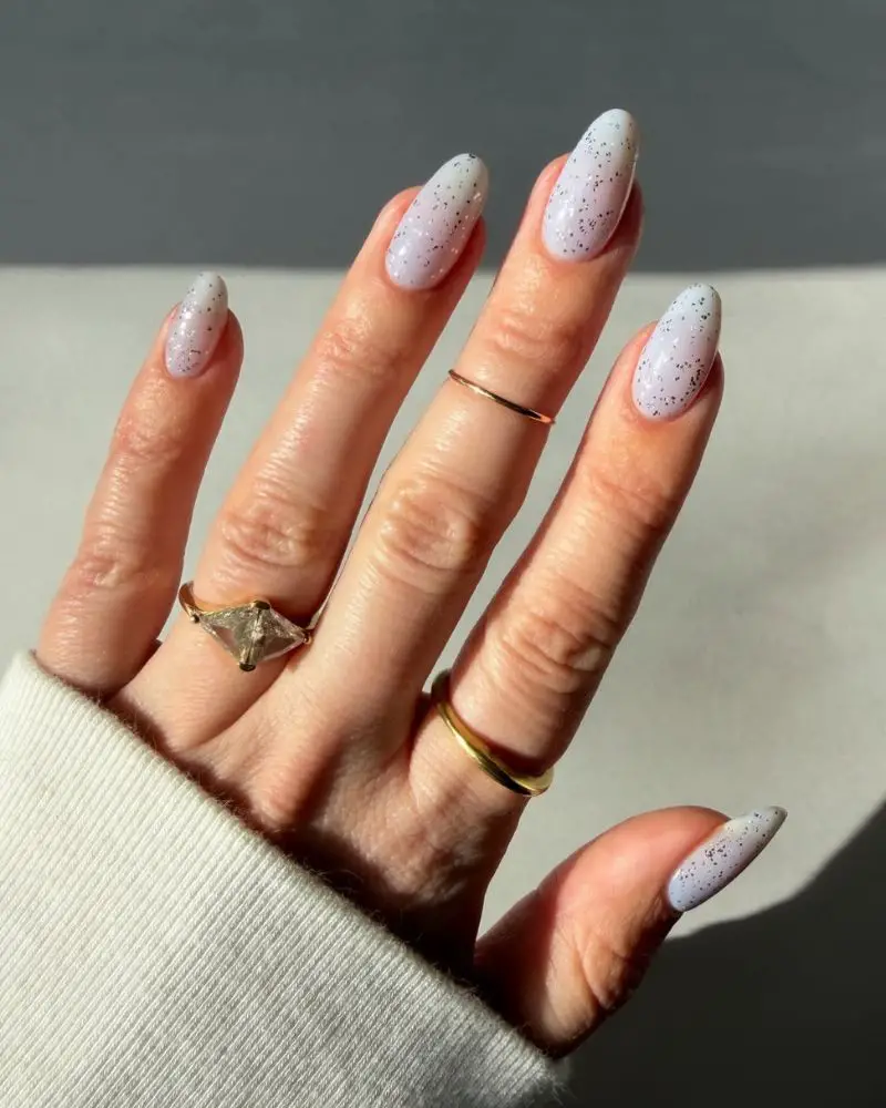 Speckled Black Glitter Pale Blue Short Oval Nails — Simple Shimmer Nails
