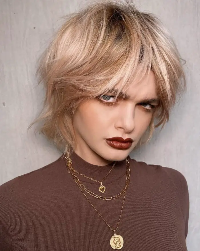 Collarbone Ash Blonde Shag Face-Framing Collarbone Ash Blonde Shag Face-Framing — Simple Short Shag