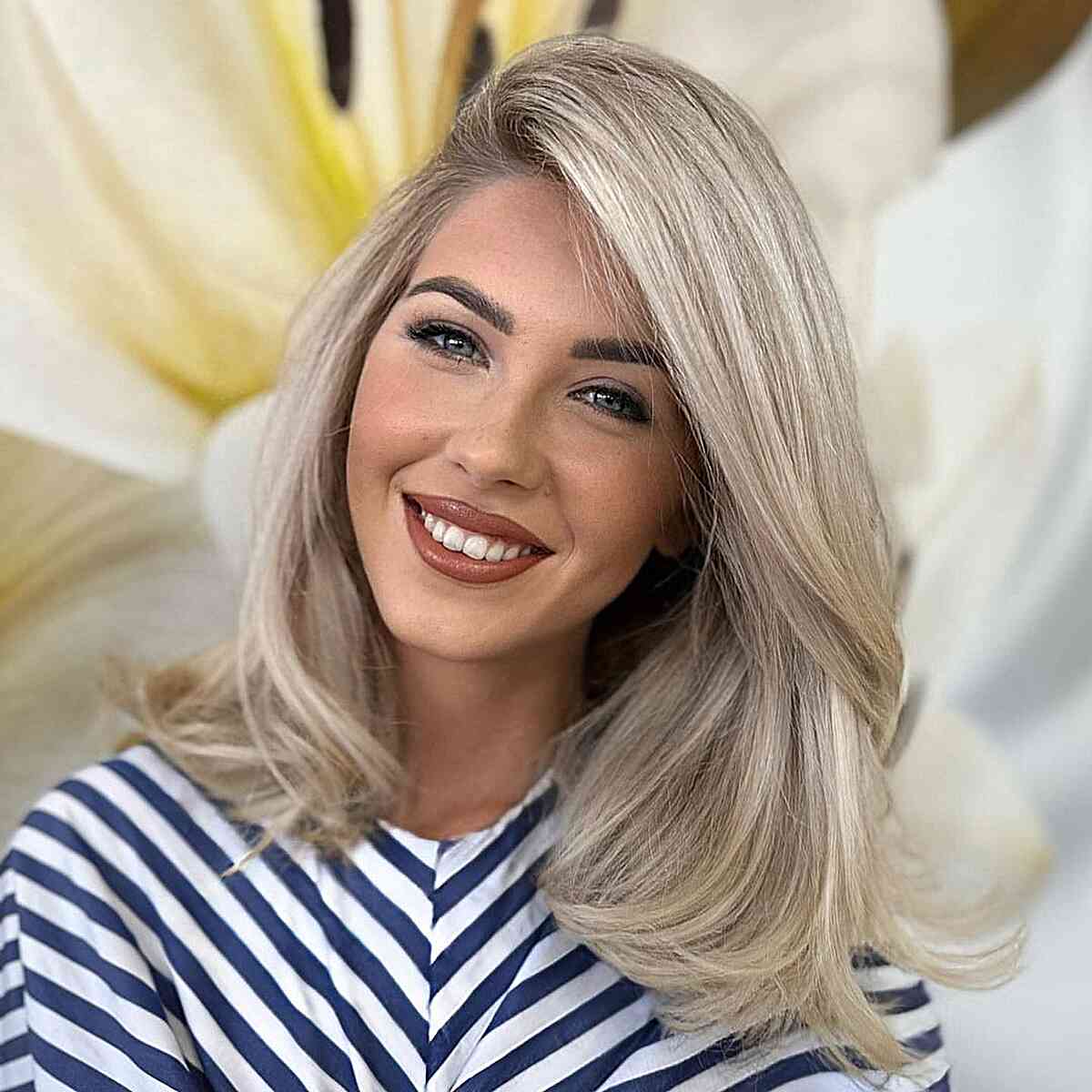 Platinum Blonde Collarbone Lob With Smooth Blowout — Simple Side Part Hairstyles