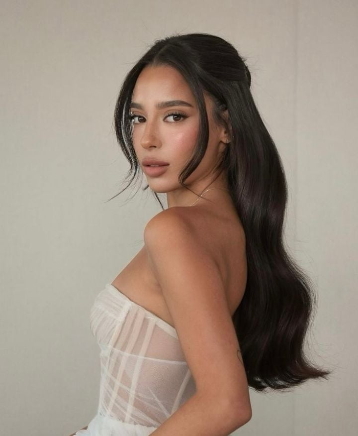 Long Dark Brown Half-Up Waves With Wispy Bangs Long Dark Brown Half-Up Waves With Wispy Bangs — Simple Strapless Dresses Hairstyles