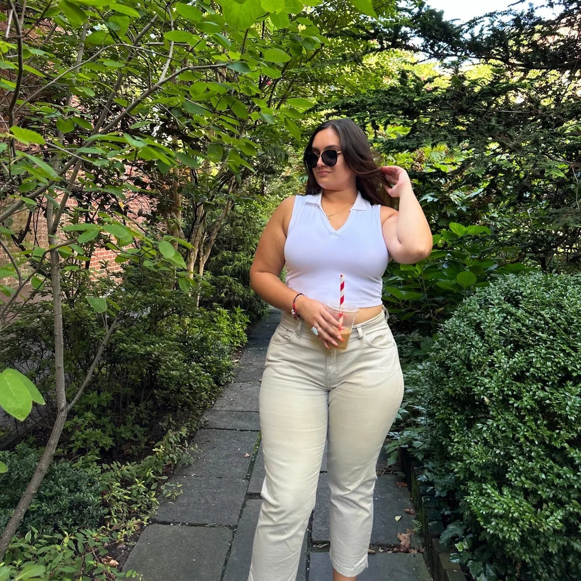 Tan High-Waisted Trousers with a White Sleeveless Top Tan High-Waisted Trousers with a White Sleeveless Top — Simple Tan Pants Outfits