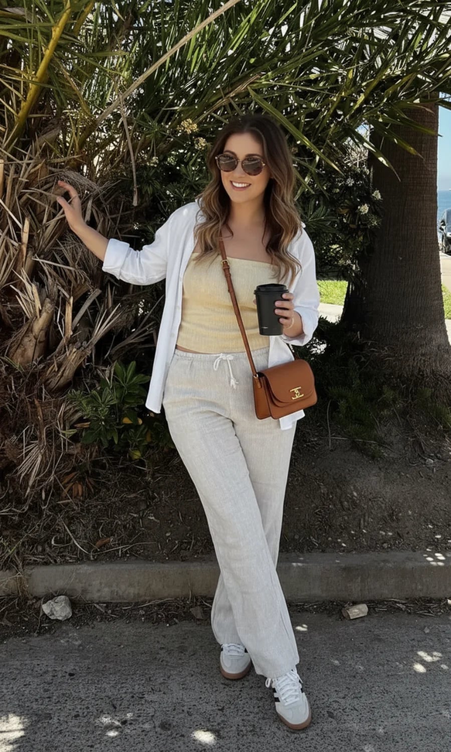 Light Beige Linen Trousers with a Yellow Tube Top and White Shirt Light Beige Linen Trousers with a Yellow Tube Top and White Shirt — Simple Tan Pants Outfits