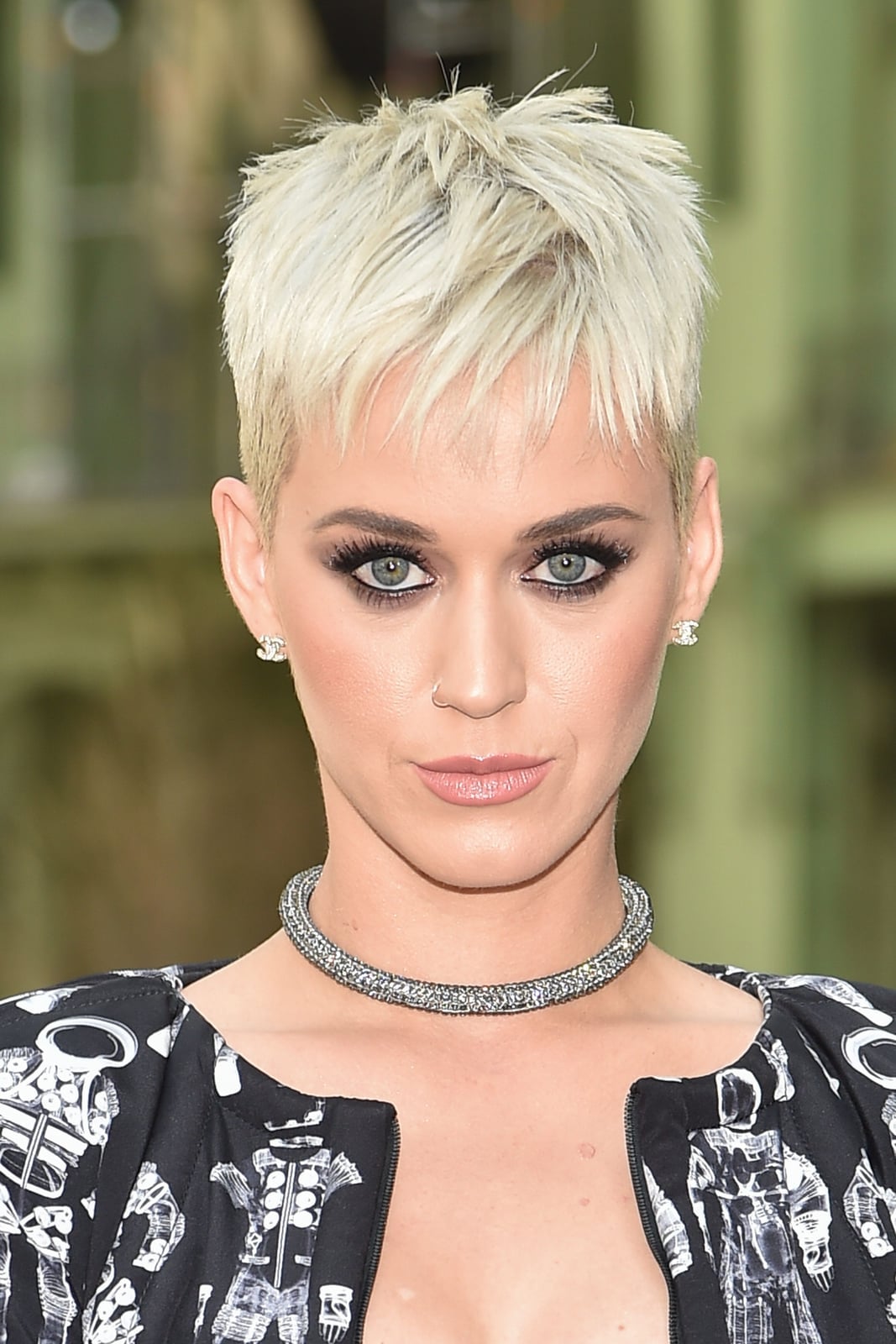 Spiky Platinum Blonde Pixie with Root Shadow Spiky Platinum Blonde Pixie with Root Shadow — Simple Textured Pixie