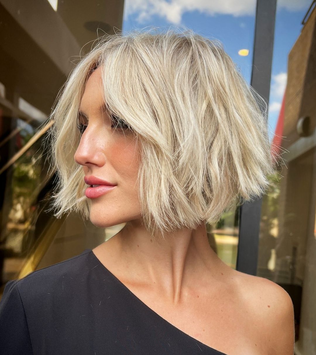 Ash Blonde Balayage Bob With Wispy Bangs Ash Blonde Balayage Bob With Wispy Bangs — Simple Thinning Hairstyles