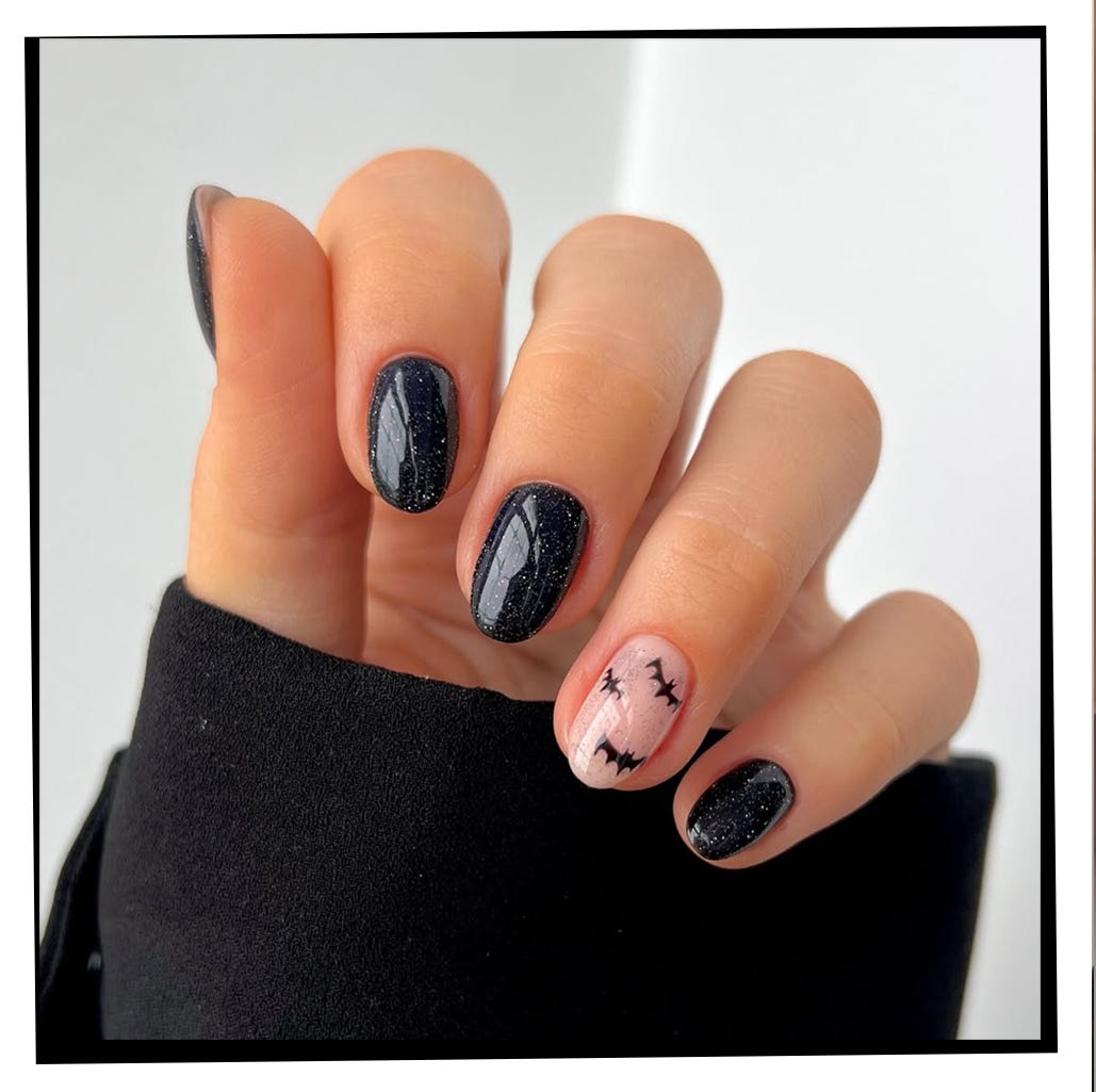 Glossy Black Glitter with Bat Accent Short Oval Nails — Simple Trending Nails