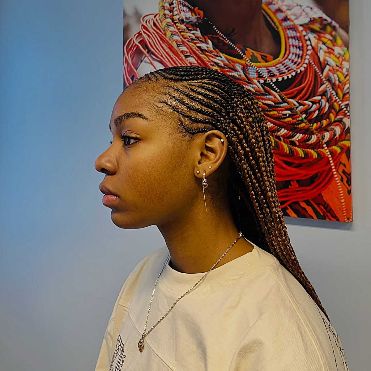 Mid-Back Cornrows With Wavy Brown And Blonde Braids Mid-Back Cornrows With Wavy Brown And Blonde Braids — Simple Tribal Braids Hairstyles