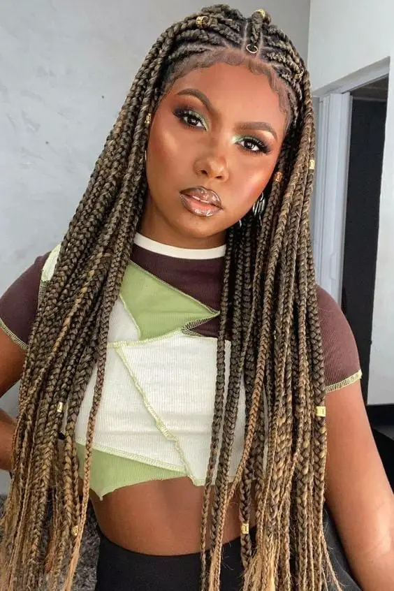 Dark Brown Box Braids With Gold Beads And Rings Dark Brown Box Braids With Gold Beads And Rings — Simple Tribal Braids Hairstyles