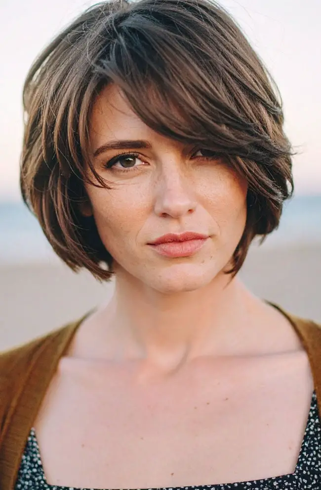 Chin Length Bob With Side-Swept Bangs Chin Length Bob With Side-Swept Bangs — Simple Voluminous Hair