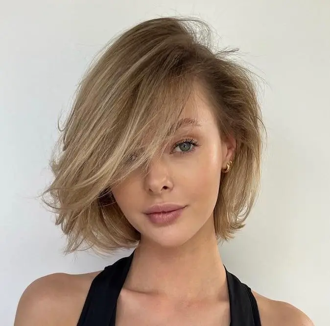 Voluminous Ash Blonde Bob With Root Shadow Voluminous Ash Blonde Bob With Root Shadow — Simple Voluminous Hair