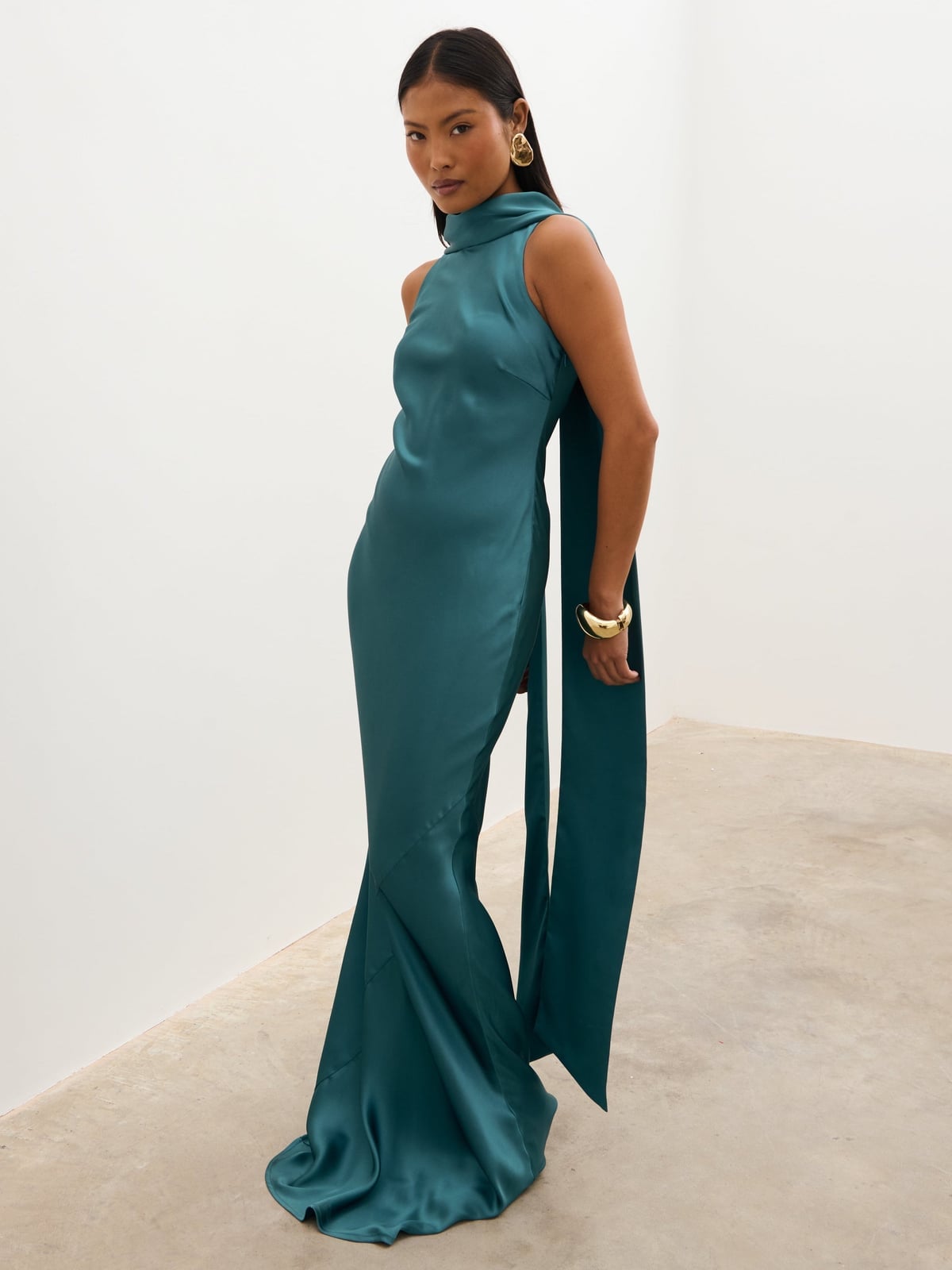 Teal Satin Gown with High Neck and Scarf Detail Teal Satin Gown with High Neck and Scarf Detail — Simple Wedding Guest Outfits