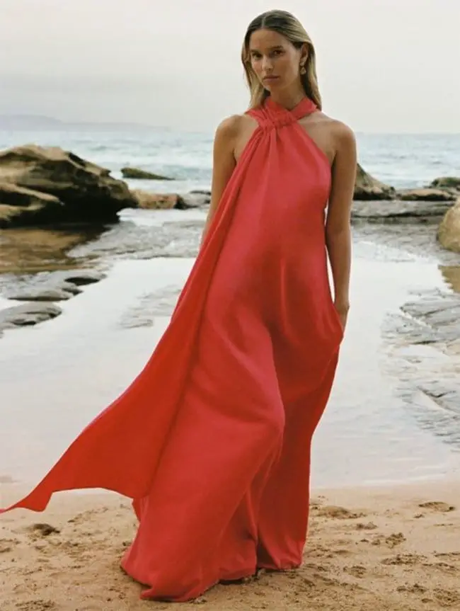 Coral Halter Neck Maxi Dress with Flowing Skirt Coral Halter Neck Maxi Dress with Flowing Skirt — Simple Wedding Guest Outfits