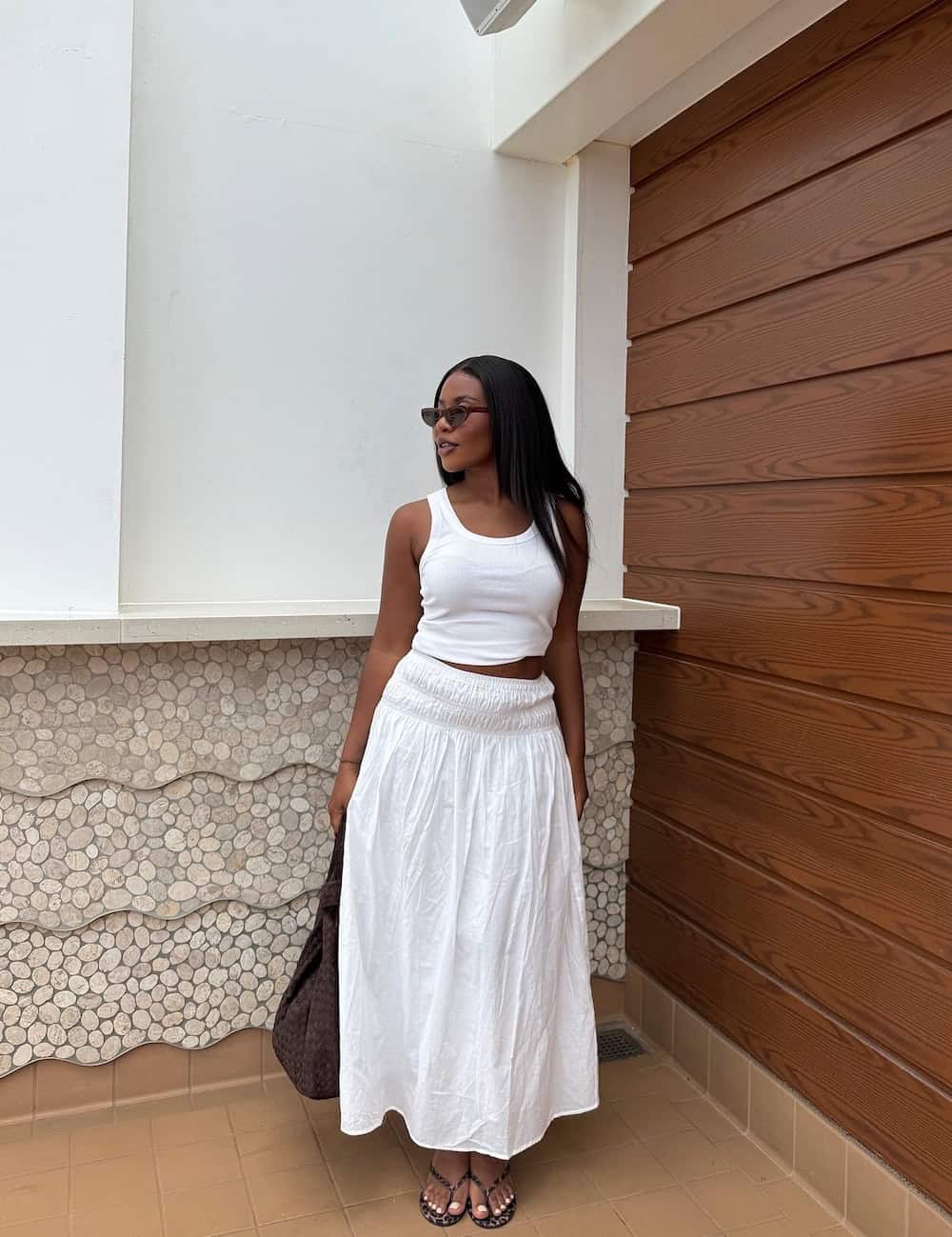 White Tank With Flowing Maxi Skirt and Fitted Top, Close-Up Take White Tank With Flowing Maxi Skirt and Fitted Top, Close-Up Take — Simple White Top Outfits
