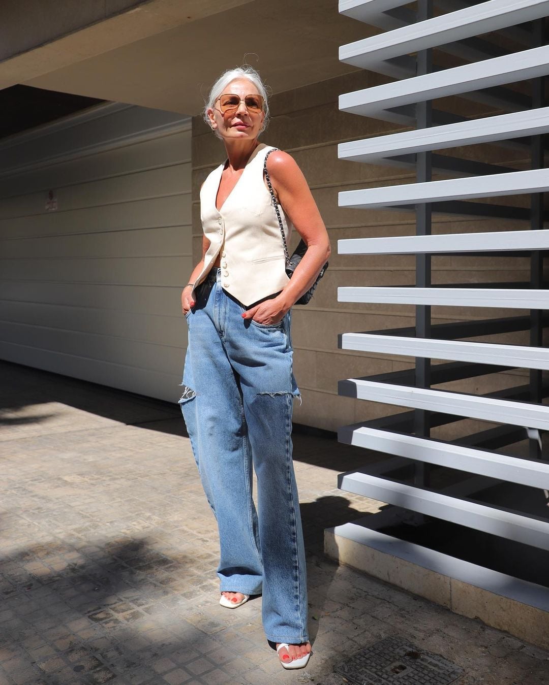 Cream Vest and White Sandals with Ripped Light Blue Wide Leg Jeans Cream Vest and White Sandals with Ripped Light Blue Wide Leg Jeans — Simple Wide Leg Jeans Outfits