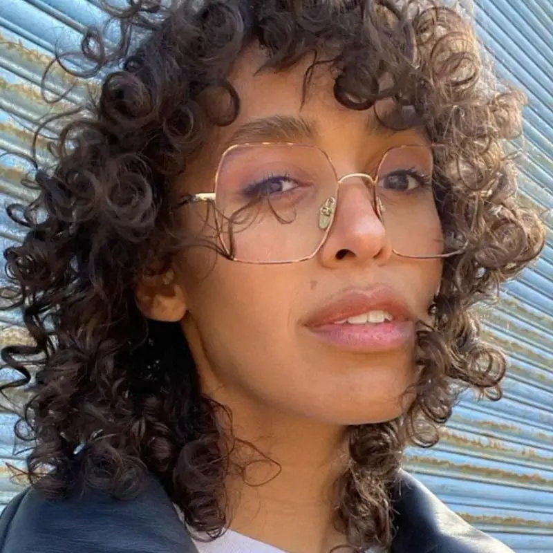Collarbone Wolf Cut Curtain Bangs — Simple Wolf Cut Curly Hair