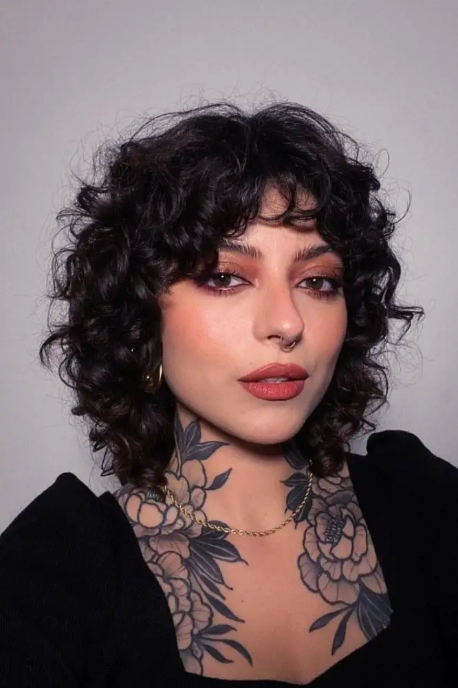 Short Dark Brown Curly Wolf Cut With Choppy Bangs Short Dark Brown Curly Wolf Cut With Choppy Bangs — Simple Wolf Cut Hair