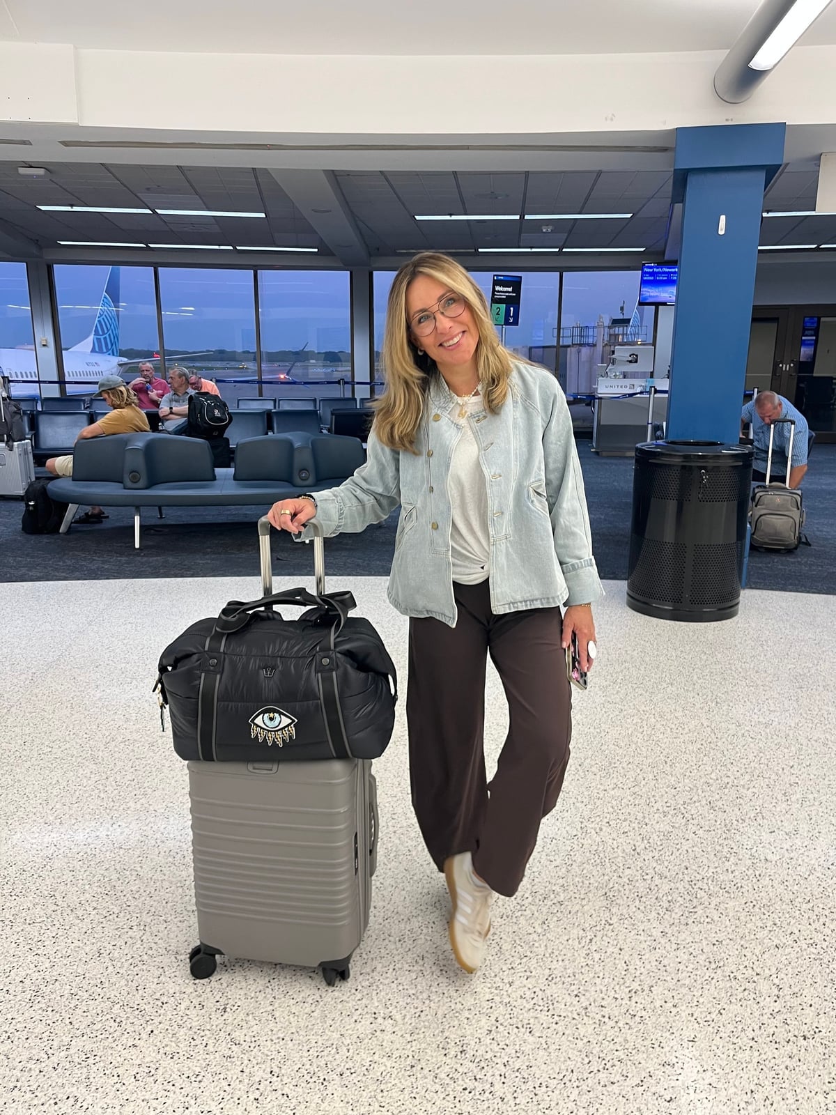 Denim Jacket and Relaxed Trousers for Casual Travel Denim Jacket and Relaxed Trousers for Casual Travel — Trendy Airport Outfits