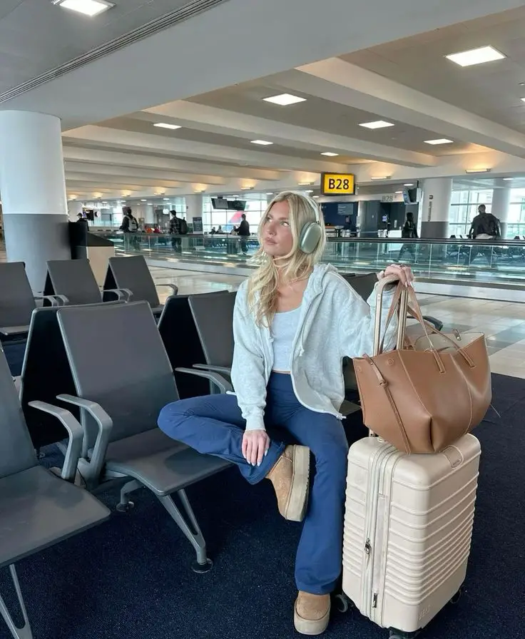 Gray Hoodie and Flared Pants for a Relaxed Travel Vibe Gray Hoodie and Flared Pants for a Relaxed Travel Vibe — Trendy Airport Outfits